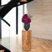 NATALIA burgundy hydrangea and corokia in Morph vase ebony styled by a staircase
