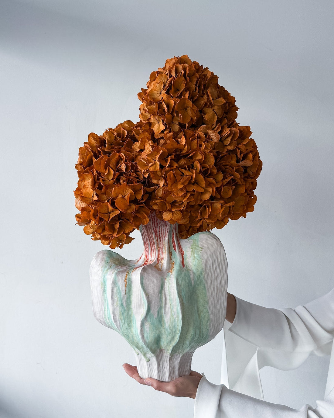 ALODIA preserved orange hydrangea arrangement in Noto vessel