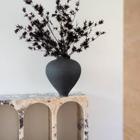 EVE faux Japanese maple in Siwa vessel styled on a stone console